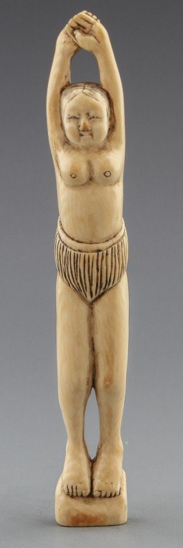 CARVED IVORY SASHI NETSUKE OF FEMALE SEA DIVER: CARVED IVORY SASHI NETSUKE OF FEMALE SEA DIVER Elongated sashi netsuke of a female ready to dive into the sea. Hair, facial expression, and loin cloth are etched and stained. Signed at base. Size: 4.7