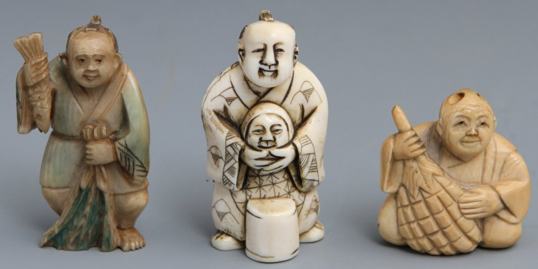 (3) JAPANESE CARVED IVORY NETSUKE FIGURES: (3) JAPANESE CARVED IVORY NETSUKE FIGURES Lot of three Japanese carved ivory netsuke figures. Signed "Isshi" seated figure with large gourd/fruit; 18g, 1.25", signed polychrome fisherman holding fish 