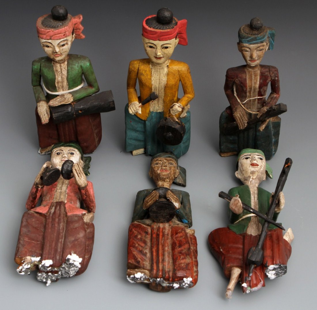 (6) CARVED AND PAINTED WOODEN HANGING MUSICIANS: (6) CARVED AND PAINTED WOODEN HANGING MUSICIANS Six carved and painted wooden musicians playing traditional instruments including the saw duang and the sueng. Nicely painted and carved with traditiona