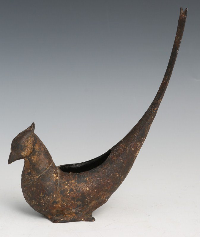 JAPANESE BRONZE PHOENIX BRUSH POT: JAPANESE BRONZE PHOENIX BRUSH POT Japanese bronze phoenix brush pot with long up swung tail. Overall good condition with age appropriate wear. Signed on base. Size: 9 x 8"
