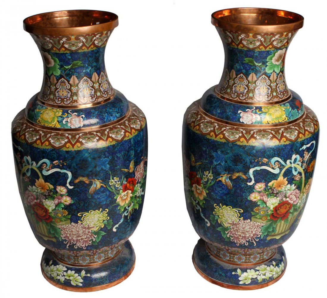 MASSIVE PAIR CLOISONNE FLOOR VASES 20TH CENTURY: MASSIVE PAIR CLOISONNE FLOOR VASES 20TH CENTURY An impressive pair of extraordinarily large Chinese cloisonne floor vases, mid 20th century. Blue color with flower motif, copper background. Very well