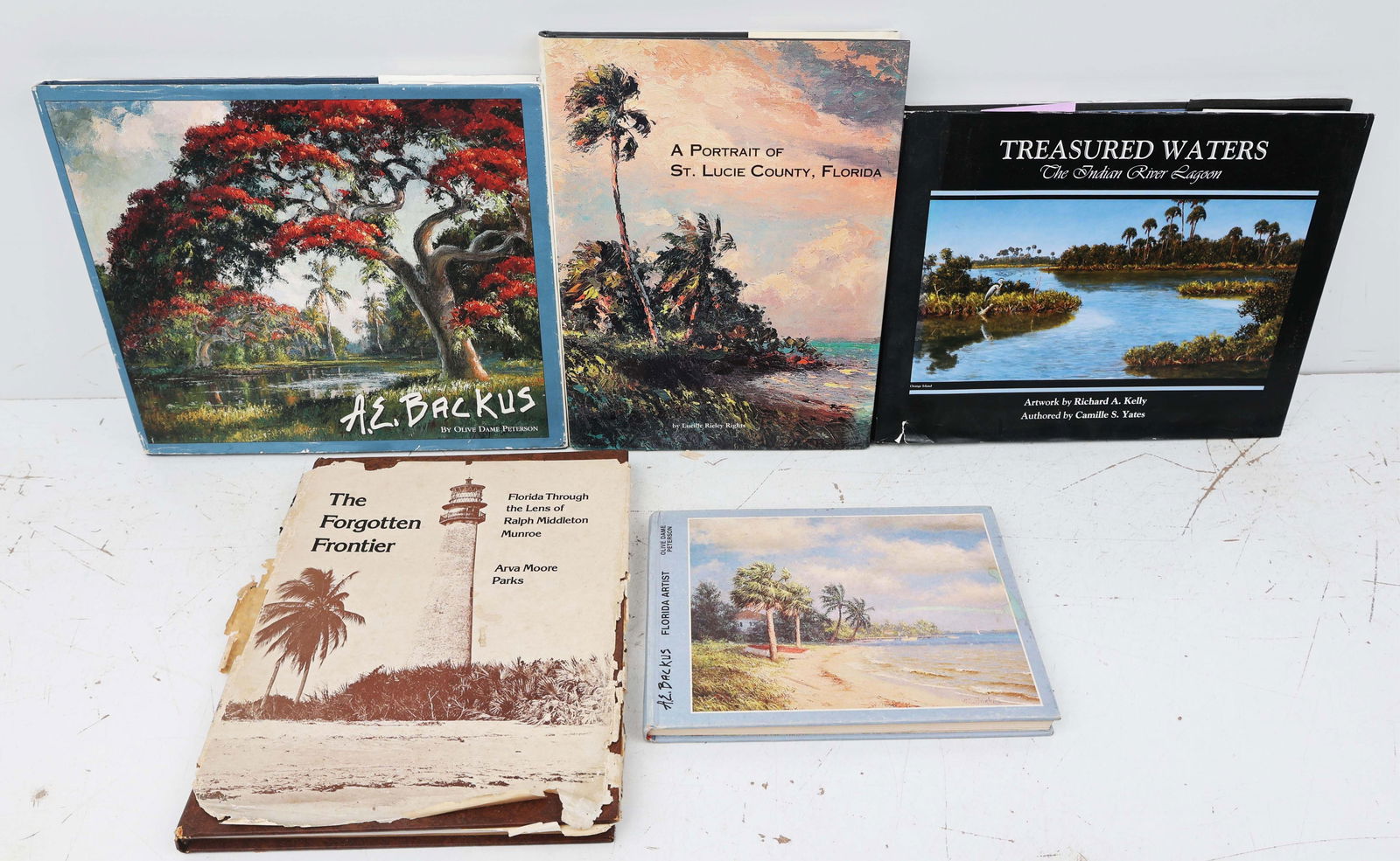 LOT OF 5 FLORIDA ARTS BOOKS A.E. BACKUS: 1. A.E. Backus - Olive Dame Peterson 1984 edition 7x9.5" 2. A.E. Backus - Olive Dame Peterson 2003 edition autographed by Olive 10.5x12.5"3. Treasured Waters - The Indian River Lagoon. Artwork