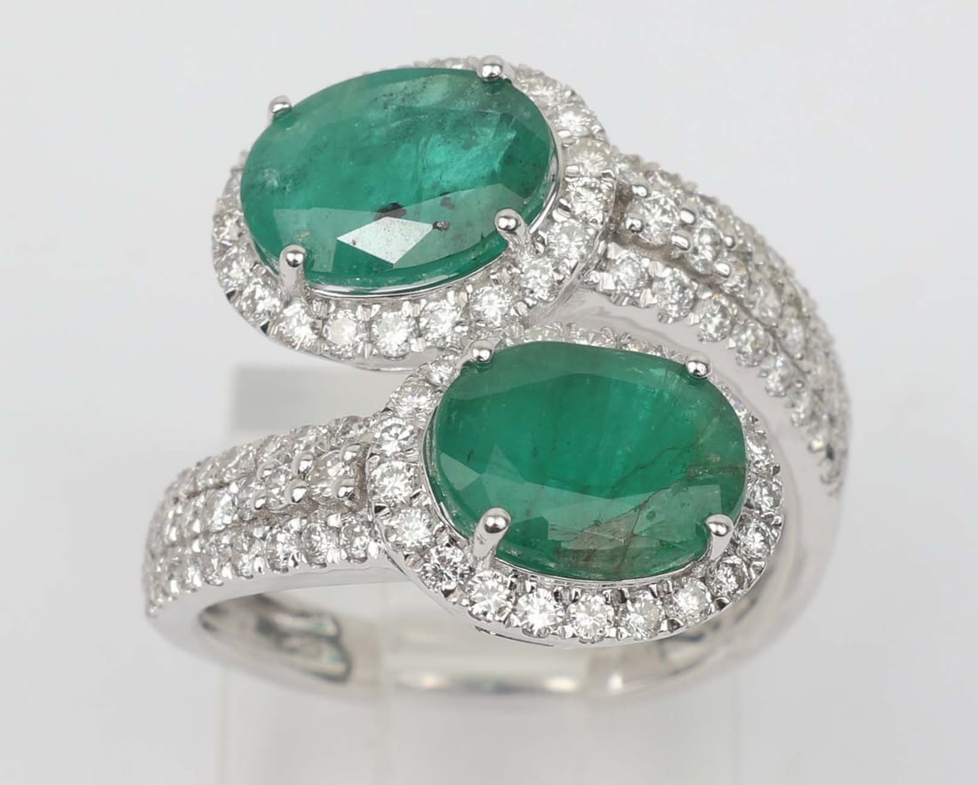 14K MICHAEL CHRISTOFF RING EMERALD & DIAMOND: 14k Michael Christoff White Gold Ring Emerald & Diamonds. .92 round diamonds totaling .99 ct. two emeralds totaling 3.75 ct. Size: 6.5 Weight: 4.7 grams Must be paid by Certified Check,