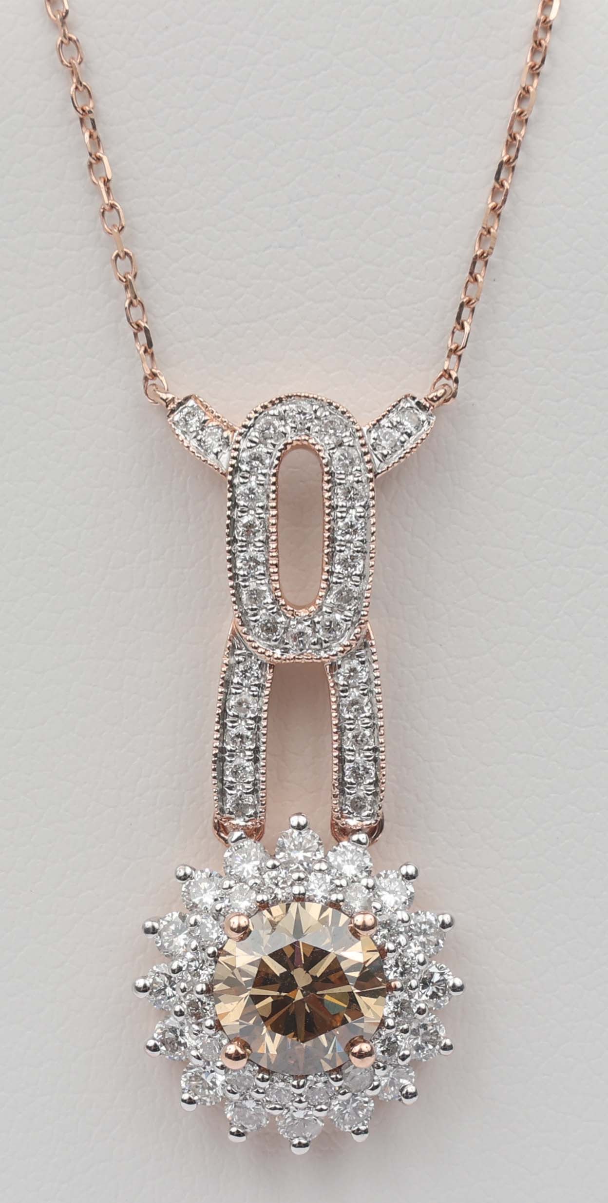 14K MICHAEL CHRISTOFF NECKLACE DIAMOND FANCY BROWN: 14k Michael Christoff Rose Gold Necklace Diamond and fancy brown champagne diamond.62 round diamonds .73 ct. ne fancy brown diamond 1.09 ct. Length: 16" Weight: 3.9 grams Must be paid by