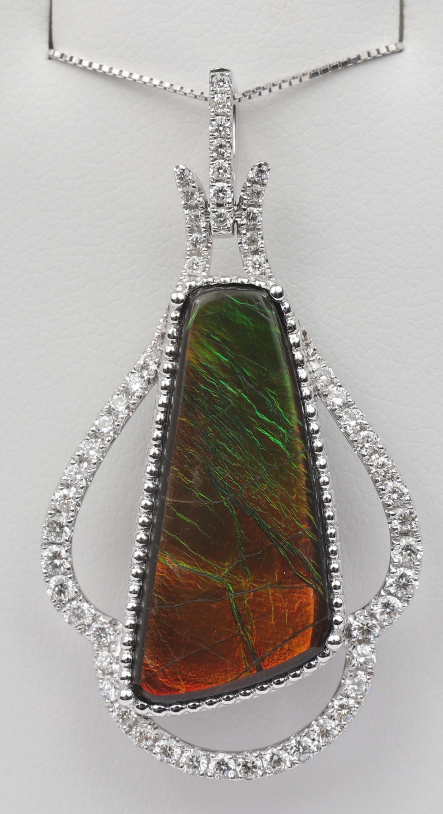 18K PENDANT DIAMOND & AUSTRALIAN BLACK OPAL: 18k White Gold Pendant Diamond and Australian Fire Opal. 54 round diamonds Vs clarity and a single black opal 8.95 ct Size / Length: 18" Weight: 7.7 grams Must be paid by Certified Check,