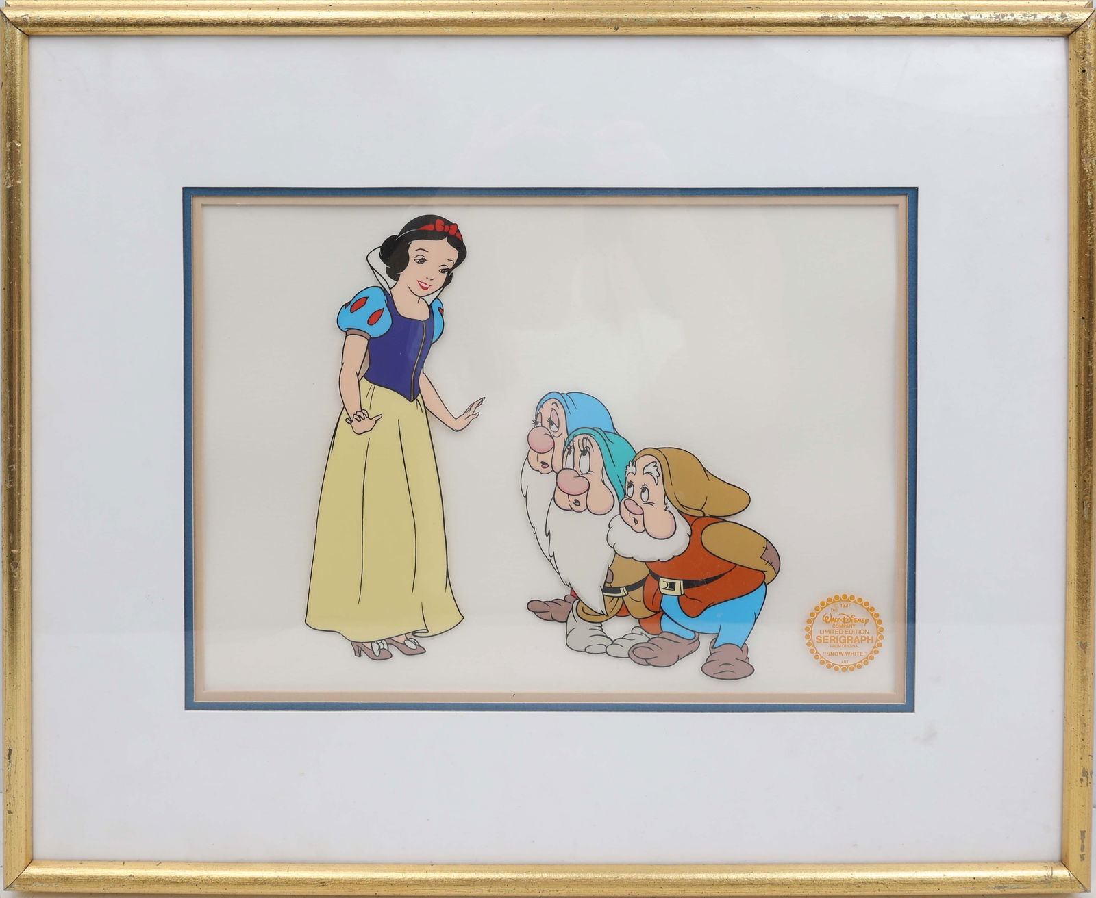 WALT DISNEY SNOW WHITE CEL SERIGRAPH: THE WALT DISNEY COMPANY "Snow White" Limited Edition Serigraph CelIn 1937, the first full-length animated film, Snow White and the Seven Dwarfs," was released by Walt Disney Studio. This classic film