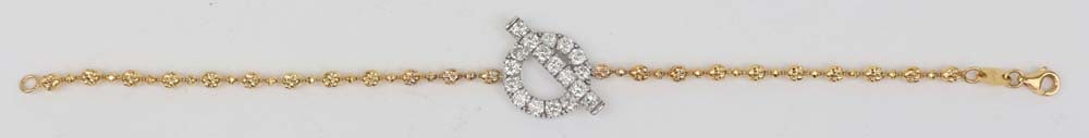 18K WHITE & YELLOW GOLD DIAMOND BRACELET: 18K White and Yellow Gold Bracelet Featuring round Diamonds. Eighteen Diamonds 1.40 ct total H color Vs clarity. Length: 7" Weight: 7.1 G Must be paid by Certified Check, money order, or wire transfer