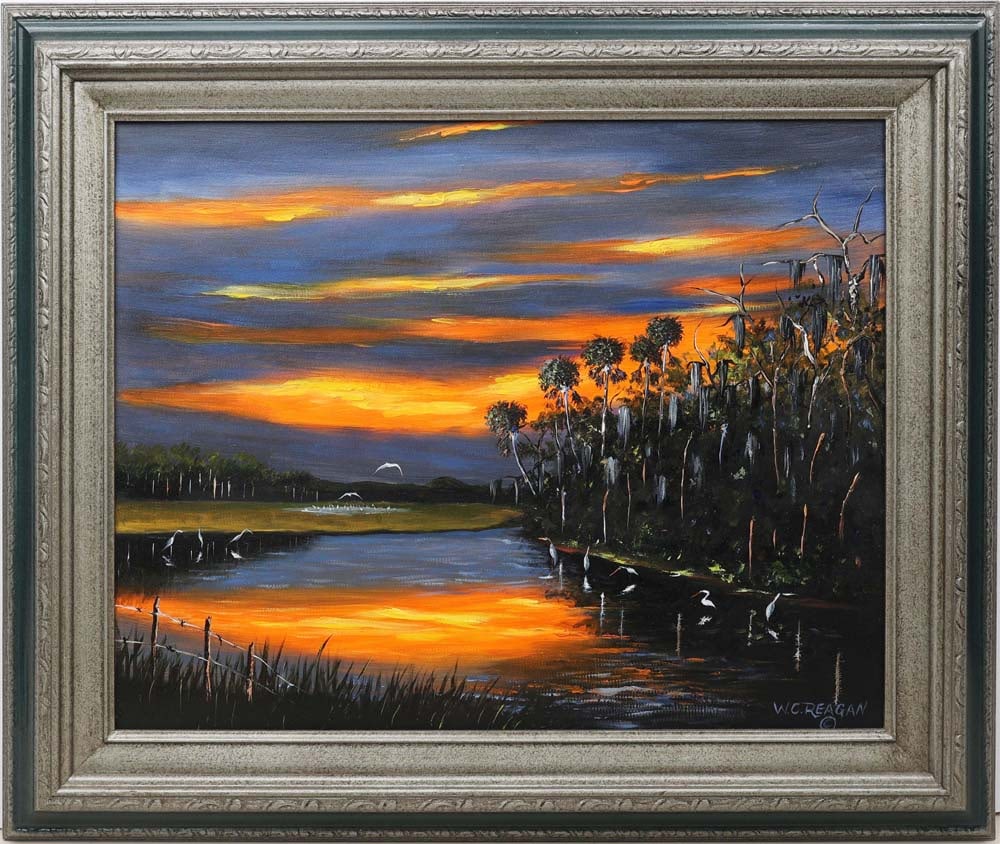 WILLIE REAGAN FLORIDA HIGHWAYMEN FIRE SKY: Reagan, Willie C. (1939 - 2026 ) Florida Highwaymen Painting. Oil on canvas - signed lower right. Executed in brush and palette knife. Vivid purple-and-orange fire sky above reflective waters, the sce
