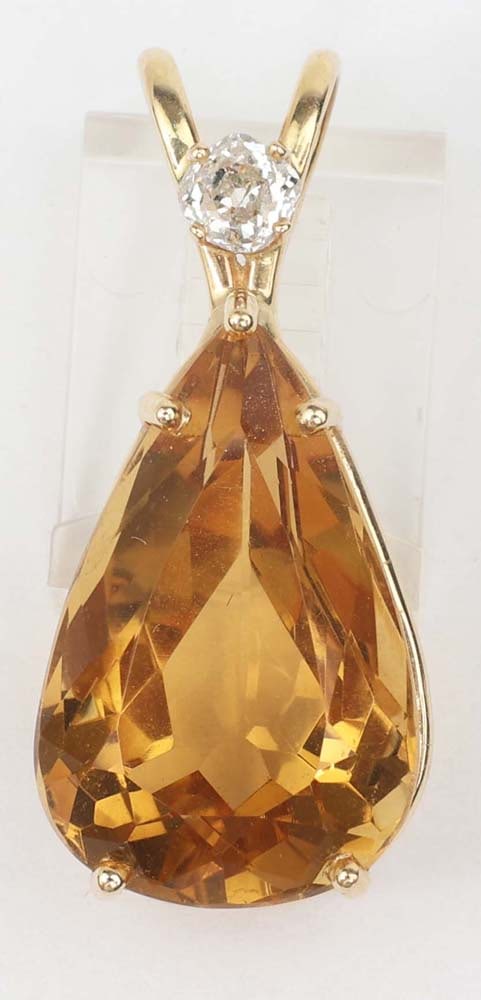 14K YELLOW GOLD TOPAZ & DIAMOND PEAR PENDANT: 14K Gold 24x48mm Golden Topaz pear shaped pendant with .10ct rose cut diamond. Weight: 9.1 grams Must be paid by Certified Check, money order, or wire transfer ($15 fee). NO CREDIT OR PERSONAL CHECK