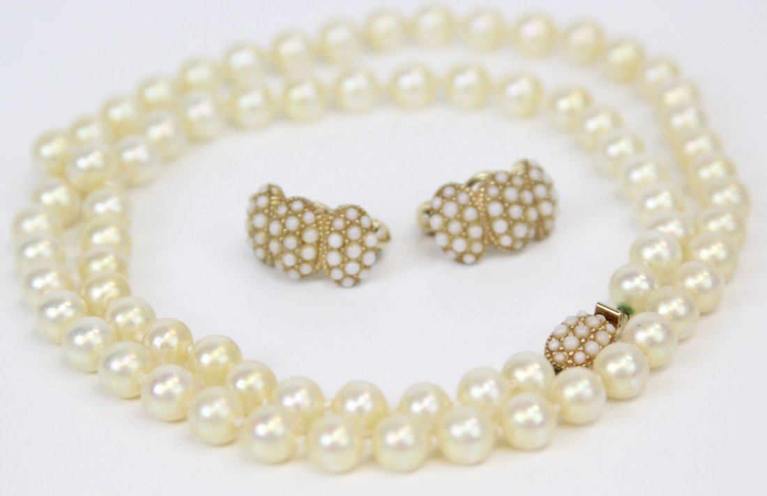 CINER VINTAGE PEARL COSTUME JEWELRY SET: CINER VINTAGE PEARL COSTUME JEWELRY SET Pair of clip-on earrings with seed pearls, 25" pearl strand with matching clasp. All marked Ciner. Weight: 55.8g