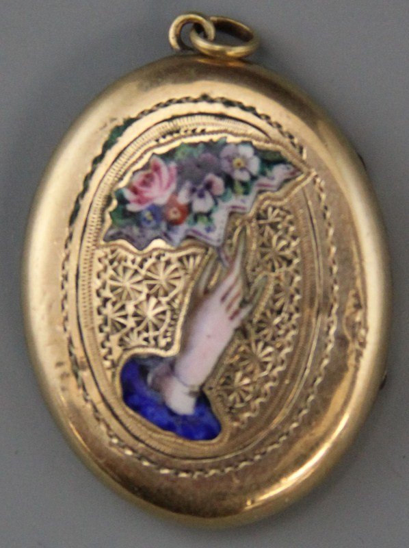 VINTAGE 14K YELLOW GOLD ENAMEL LOCKET: VINTAGE 14K YELLOW GOLD ENAMEL LOCKET Ladies vintage 14K yellow gold locket pendant with enamel accents featuring a ladies hand holding a bouquet. Weight: 5.5g Size: 1"