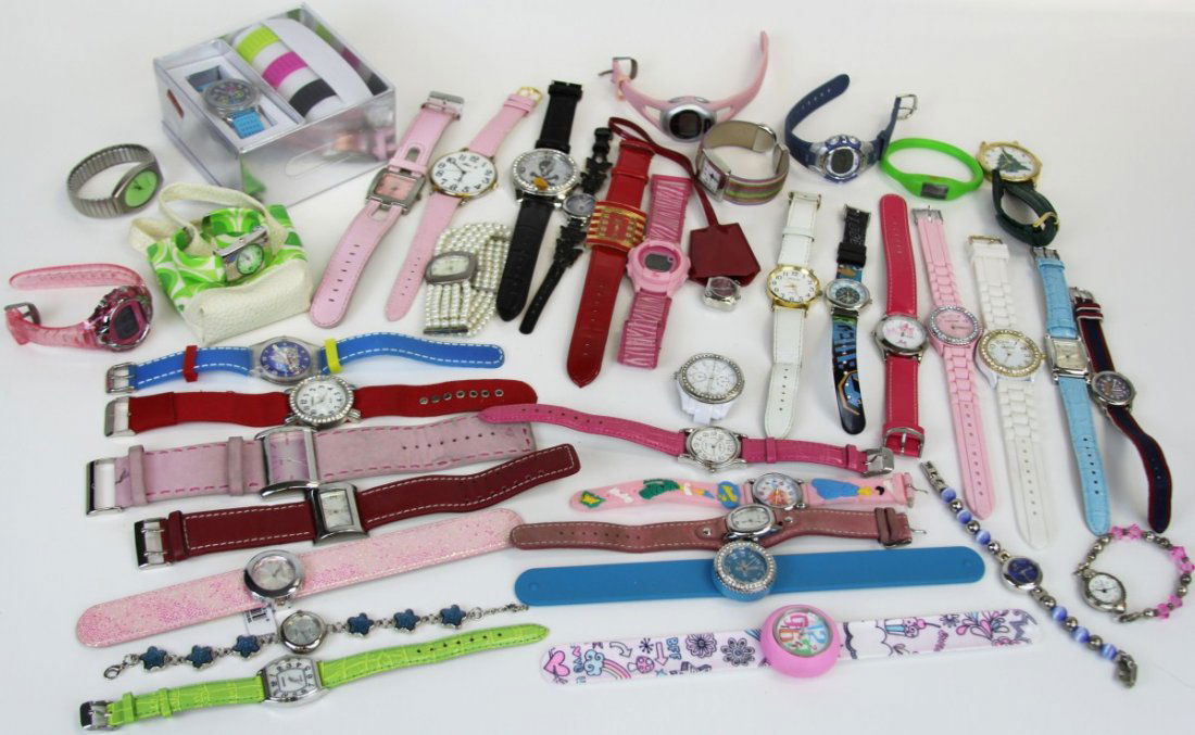 39 YOUNG LADIES WATCHES: 39 YOUNG LADIES WATCHES Lot of 39 miscellaneous young ladies watches including, Accutime, Wrist Wrappers, Guess, Gossip, and more.