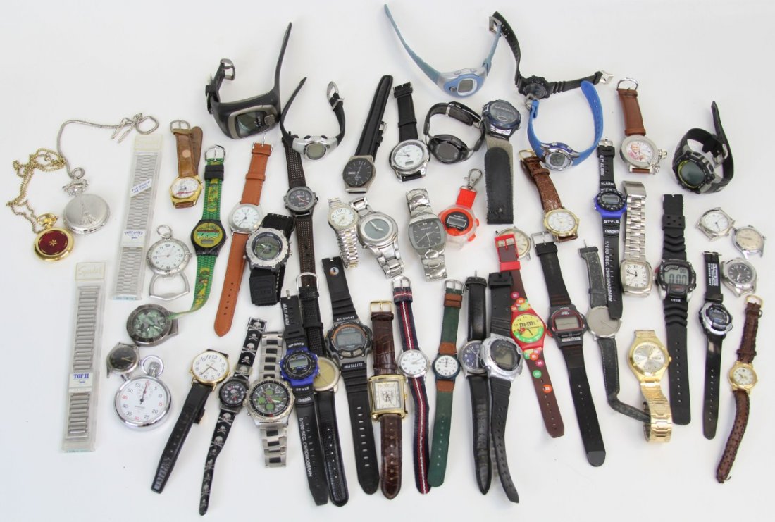 (50 MENS WATCHES AUTOMATIC AND QUARTZ: (50 MENS WATCHES AUTOMATIC AND QUARTZ Lot of 50 men's watches including Waltham, Timex, Runours, Fossil, and many more.