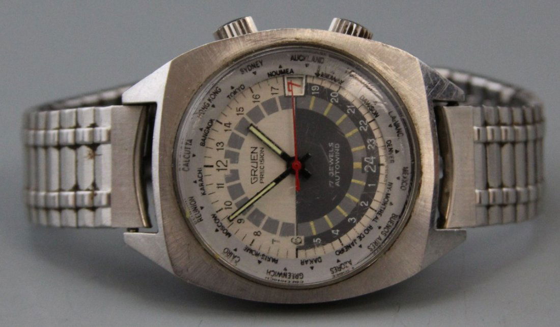RARE GRUEN PRECISION AUTOWIND 24 HOUR WRISTWATCH: RARE GRUEN PRECISION AUTOWIND 24 HOUR WRISTWATCH Rare Gruen Precision Autowind 17 Jewel 24 Hour Military World Timer Wristwatch, stainless steel case with silver toned hour and minute hand with red sw