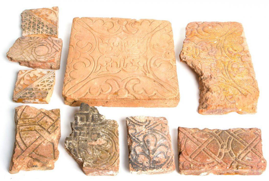 NINE ASSORTED PIECES OF MEDIEVAL EARTHENWARE TILES: NINE ASSORTED PIECES OF MEDIEVAL EARTHENWARE TILES A lot of nine assorted, damaged, pieces of medieval earthenware tiles. The largest piece being 8 3/8 x 8 1/8 x 1 3/8", the smallest being 3 x 3 x 1/2