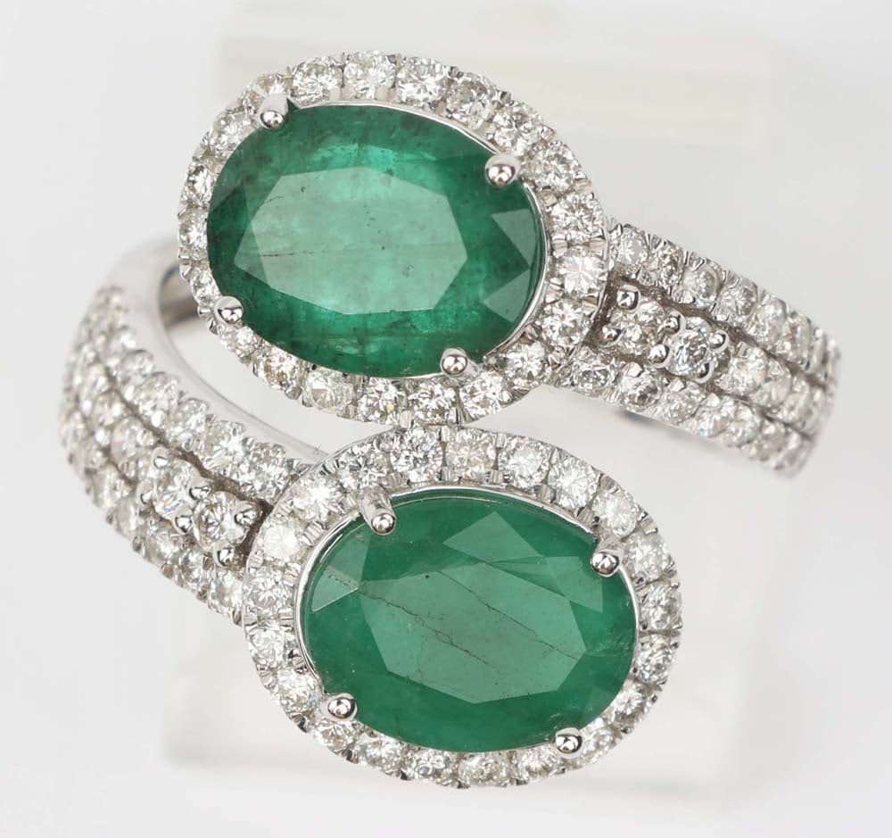 14K WHITE GOLD EMERALD & DIAMOND RING: 14k white gold Emerald & Diamond Ring. Designer Michael Christoff. Gemstones: Emerald & Diamond 92 round diamonds totaling 1 ct.2 Brazilian emeralds totaling 3.49 ct. 14k white gold. exceptional