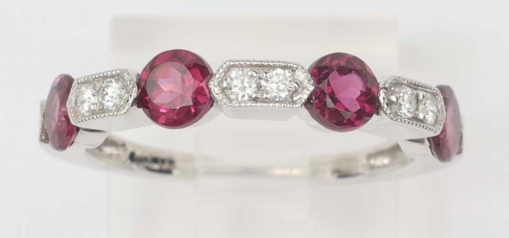 14K WHITE GOLD PURPLE SAPPHIRE DIAMOND RING: 14k white gold purple sapphire & Diamond Ring. Designer Michael Christoff. Gemstones: Purple Sapphire & Diamond 10 round diamonds totaling .18ct.Four sapphires totaling 1.43 ct. 14k white gold Size: 6