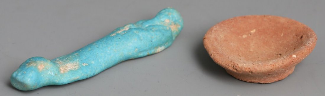 ANCIENT EGYPTIAN BLUE FAIENE USHABTI & CLAY BOWL: ANCIENT EGYPTIAN BLUE FAIENE USHABTI & CLAY BOWL Ancient Egyptian blue faiene Ushabti figure with clay bowl, circa 1500-500 B.C., set in display box with COA. Size: Ushabti; 3.75" Bowl; 2"