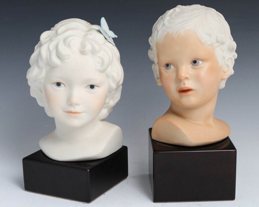 CYBIS PORCELAIN BUSTS EROS & GIRL WITH BUTTERFLY: CYBIS PORCELAIN BUSTS EROS & GIRL WITH BUTTERFLY Porcelain figurines by Cybis, both signed and on wooden bases. Boy, "Eros", and girl with butterfly in her hair. Size: 10", 9"