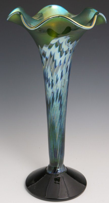 LUNDBERG FLUTED TRUMPET VASE - SIGNED: LUNDBERG FLUTED TRUMPET VASE - SIGNED Tall trumpet vase with oil spot design. Green with silver / blue decoration. Signed : J S Lundberg glass Art 2003. With attached foiled label. Size: 10.25" Tall
