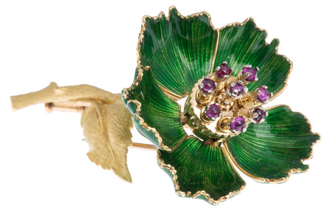 18K GOLD ENAMEL MECHANICAL BLOOMING FLOWER BROOCH: 18K GOLD ENAMEL MECHANICAL BLOOMING FLOWER BROOCH Antique 18K yellow gold and green enamel flower brooch. Mechanical enameled flower petals open up to a bloom of 8 small cabochon purple spinels. Weigh