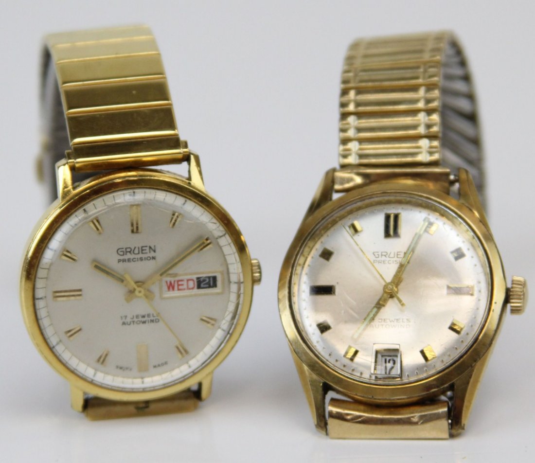 (2) GRUEN MEN'S AUTOMATIC WRIST WATCHES: (2) GRUEN MEN'S AUTOMATIC WRIST WATCHES Lot of two men's Gruen wrist watches; Gruen Precision, Swiss made 17 Jewel. Gold tone base metal bezel and band, stainless steel back, white dial with gold tone
