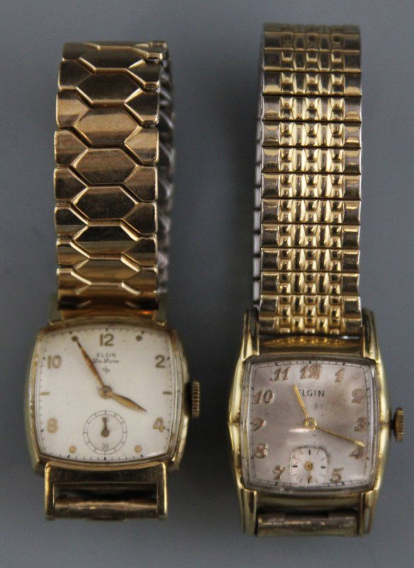 (2) ELGIN MANUAL WRISTWATCHES: (2) ELGIN MANUAL WRISTWATCHES Two Elgin Manual Wristwatches. The first is a Elgin Deluxe 10K gold filled case, gold toned hour and minute hands, gold toned baton and art deco numerals, silver face wit