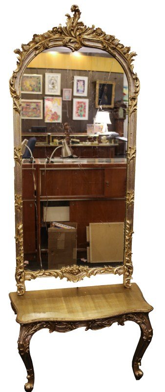 LA BARGE MIRROR COMPANY GOLD GILT MIRROR W/ BENCH: LA BARGE MIRROR COMPANY GOLD GILT MIRROR W/ BENCH La Barge Mirror Company Italian made Art Nouveau style gilt mirror and bench with carved floral scrolling. La Barge sticker on mirror and bench. Size: