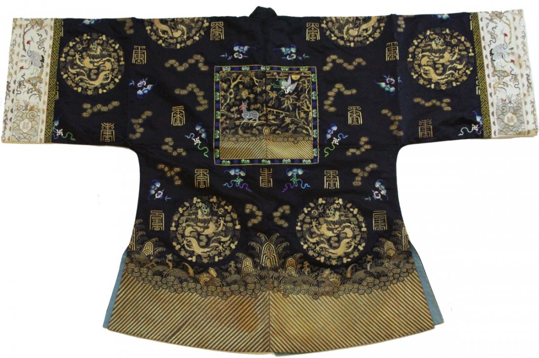 EARLY 20 C CHINESE SILK EMBROIDERED DRAGON ROBE: EARLY 20 C CHINESE SILK EMBROIDERED DRAGON ROBE Early 20th century Chinese silk embroidered dragon robe. Gilt thread, dragons, bats, and elks. Lined with silk, button closures. Size: 40 x 64"
