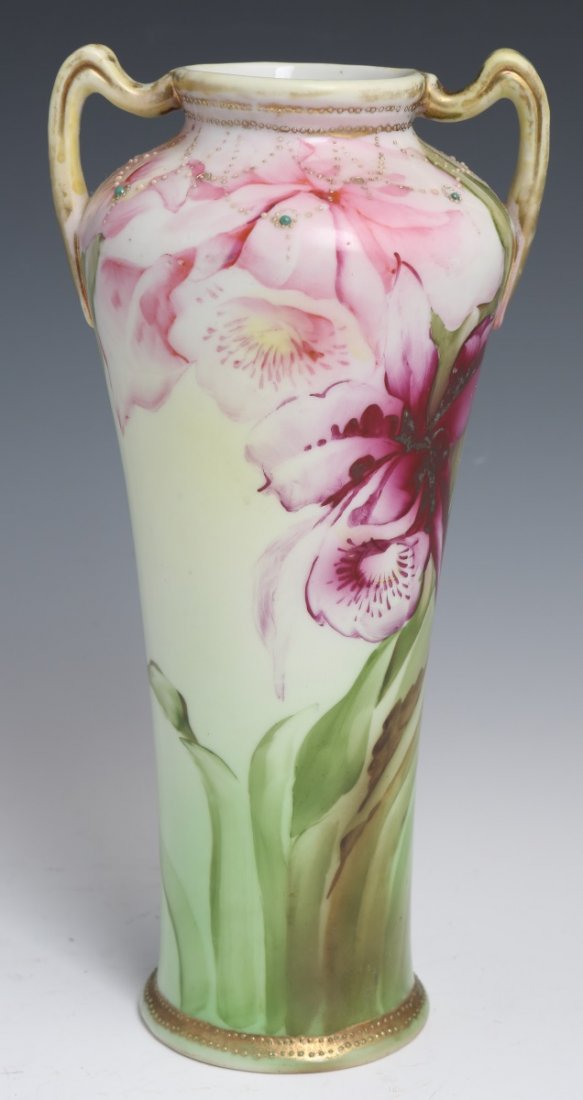 MAPLE LEAF NIPPON HAND PAINTED URN STYLE VASE: MAPLE LEAF NIPPON HAND PAINTED URN STYLE VASE Nippon urn style vase. Maple Leaf stamp in green. Hand painted floral design with enamel and gold bead moriage trim. Dates back to 1891. Size: 10" Conditi