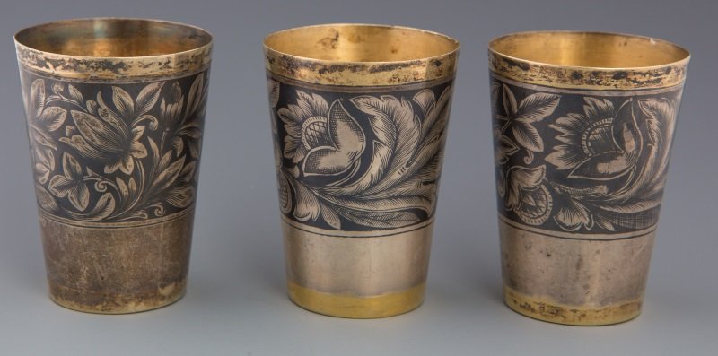 (3) RUSSIAN 875 SILVER CUPS: (3) RUSSIAN 875 SILVER CUPS Three small silver cups. 875 Russian silver with gold wash. Marked C43 and M with a hammer and sickle inside a star and 875. Weight 116.5g Size: 2.25" Condition: Very good.