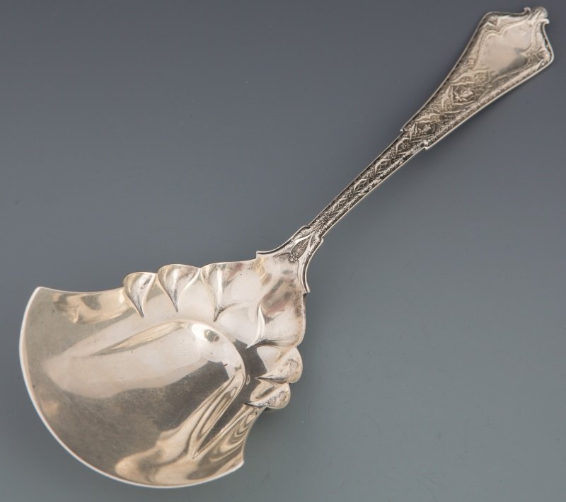 M WEBSTER STERLING SPOON SHOVEL: M WEBSTER STERLING SPOON SHOVEL Large shovel spoon with great floral design. Back stamped "M Webster Sterling TK 71 187". Weight 99.8g Size: 9.5" Condition: Very good, some use.