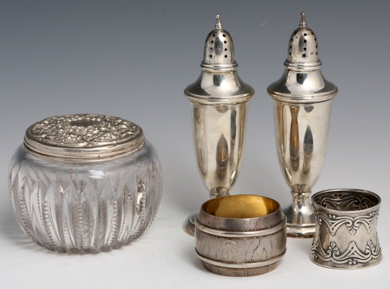 (5) ANTIQUE STERLING SHAKERS NAPKIN RINGS & JAR: (5) ANTIQUE STERLING SHAKERS NAPKIN RINGS & JAR Lot of five total, includes a pair of PS CO sterling silver salt and pepper shakers, one napkin ring marked "Sterling 1682" on inside, one napkin ring i