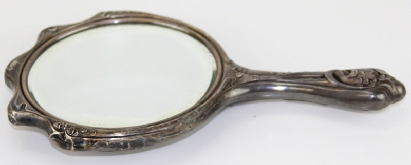 ART NOUVEAU UNGER BROS STERLING SILVER HAND MIRROR: ART NOUVEAU UNGER BROS STERLING SILVER HAND MIRROR Unger Bros Sterling Silver Repousse Hand Mirror, Known for their strong Art Nouveau repousse designs, the Unger Brothers became one of the premier an