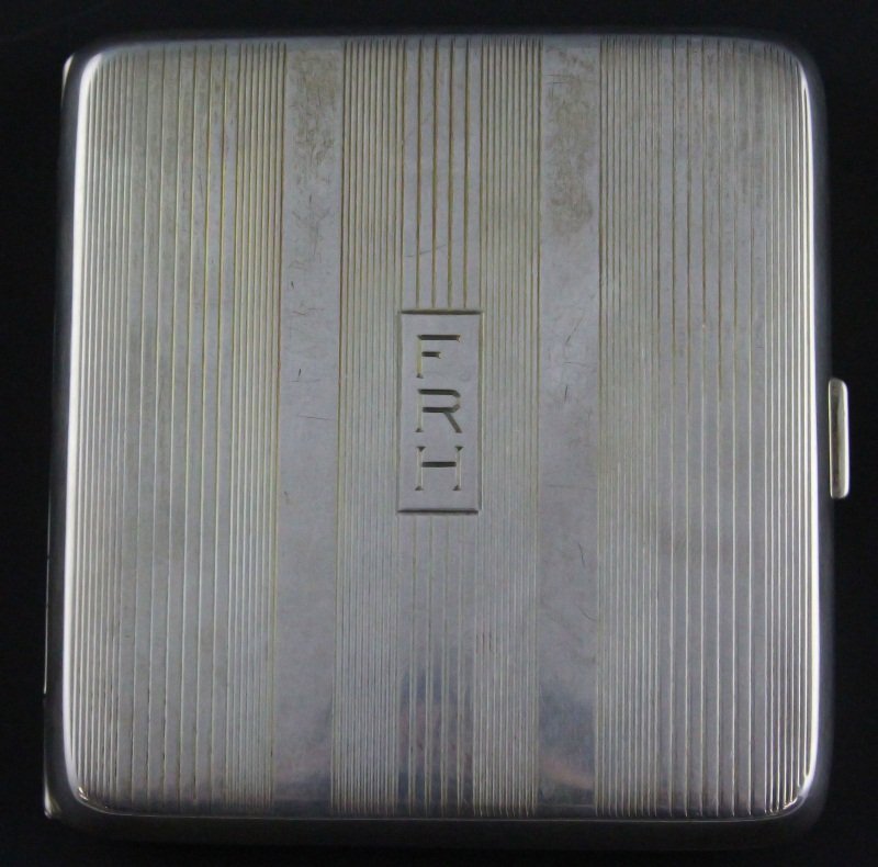 DUNHILL STERLING SILVER CIGARETTE CASE: DUNHILL STERLING SILVER CIGARETTE CASE Dunhill sterling silver cigarette case, striped and monogrammed "FRH". Inside has two piece metal guards and is marked "Dunhill Sterling" on rim. Weight 135g Siz