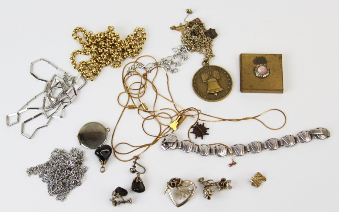 VINTAGE MIXED COSTUME JEWELRY: VINTAGE MIXED COSTUME JEWELRY Mixed lot of vintage jewelry, includes four vintage pins; liberty bell medal with chain; two lockets; stone earrings and pendant; floral earrings with matching pin; flora