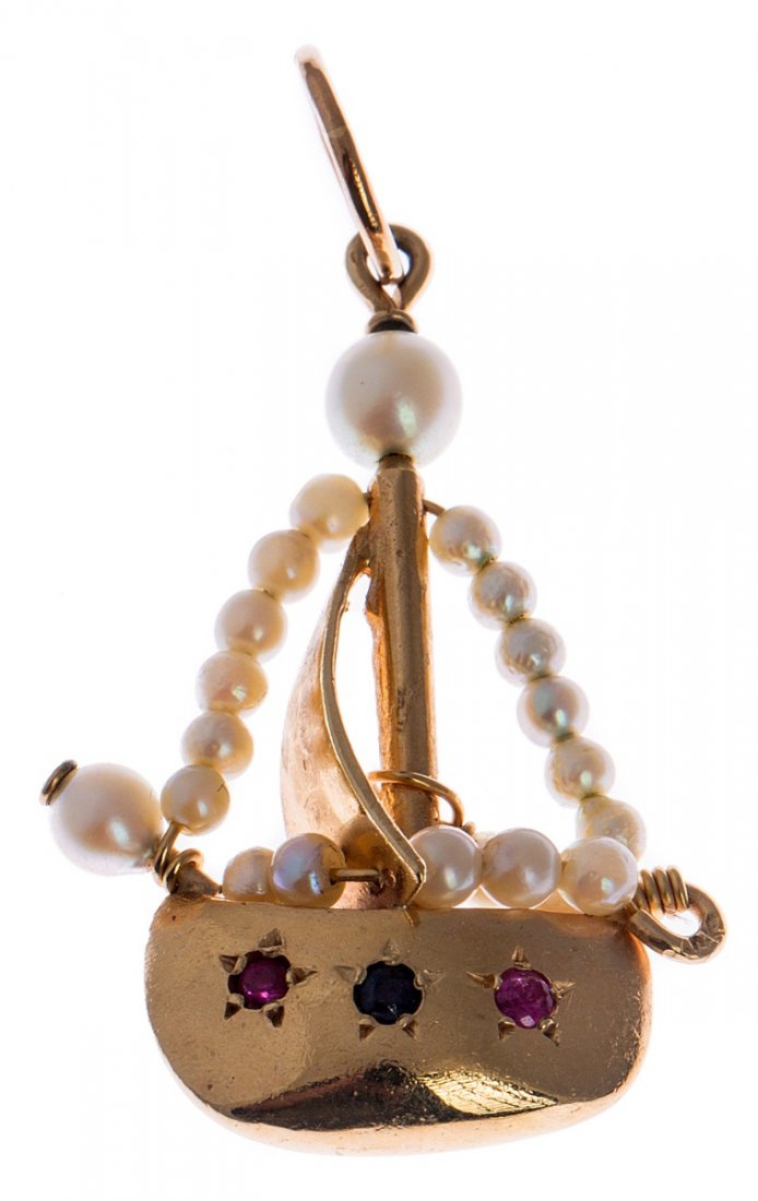 14K YELLOW GOLD SEED PEARL SAILBOAT PENDANT: 14K YELLOW GOLD SEED PEARL SAILBOAT PENDANT A 14K yellow gold sailboat pendant. Sail accented with seed pearls. Hull accented with 2 rubies and 1 sapphire. Weight: 5g Size: 1.5" Condition: Very good.
