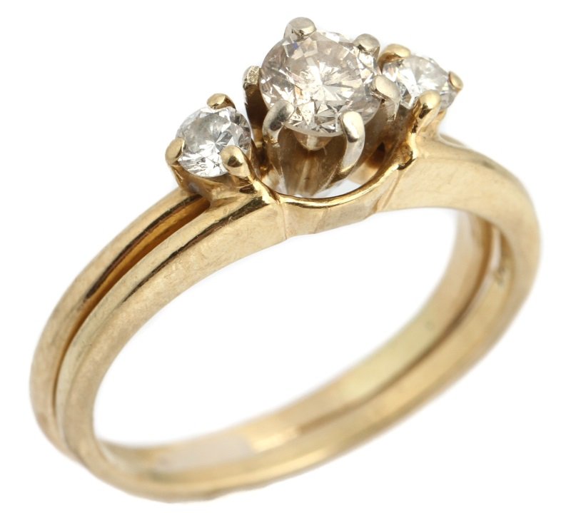 LADIES 14K GOLD DIAMOND SOLITAIRE ENGAGEMENT RING: LADIES 14K GOLD DIAMOND SOLITAIRE ENGAGEMENT RING Ladies 0.5 ct round cut diamond solitaire engagement ring with diamond enhancer. Enhancer has 2 round cut diamonds of 0.1 ct each. Approximately 0.7 C