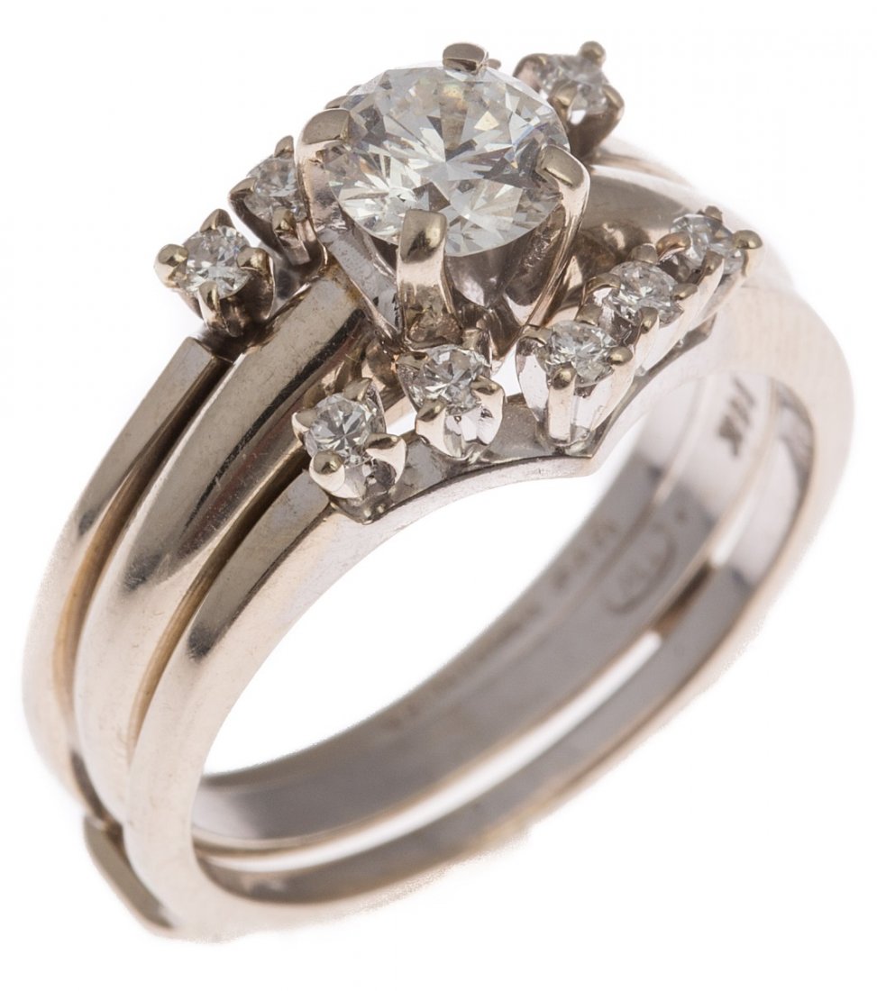 14K WHITE GOLD DIAMOND SOLITAIRE ENGAGEMENT RING: 14K WHITE GOLD DIAMOND SOLITAIRE ENGAGEMENT RING Ladies 14K white gold solitaire engagement ring with a 0.61 ct round brilliant cut diamond of approximately VS-2 clarity and I-J color. With a 14K whit