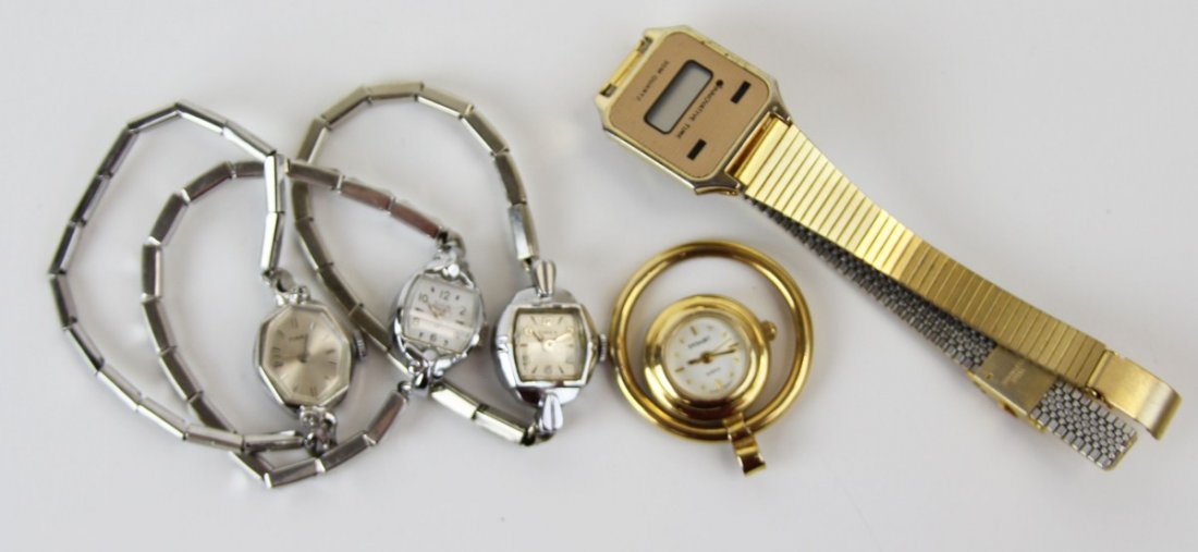 (3) LADIES VINTAGE AUTOMATIC WATCHES: (3) LADIES VINTAGE AUTOMATIC WATCHES Three vintage ladies automatic watches, two Timex and one by Elgin. All with metal stretch bands. Also included is quartz watch pendant and men's digital quartz wa