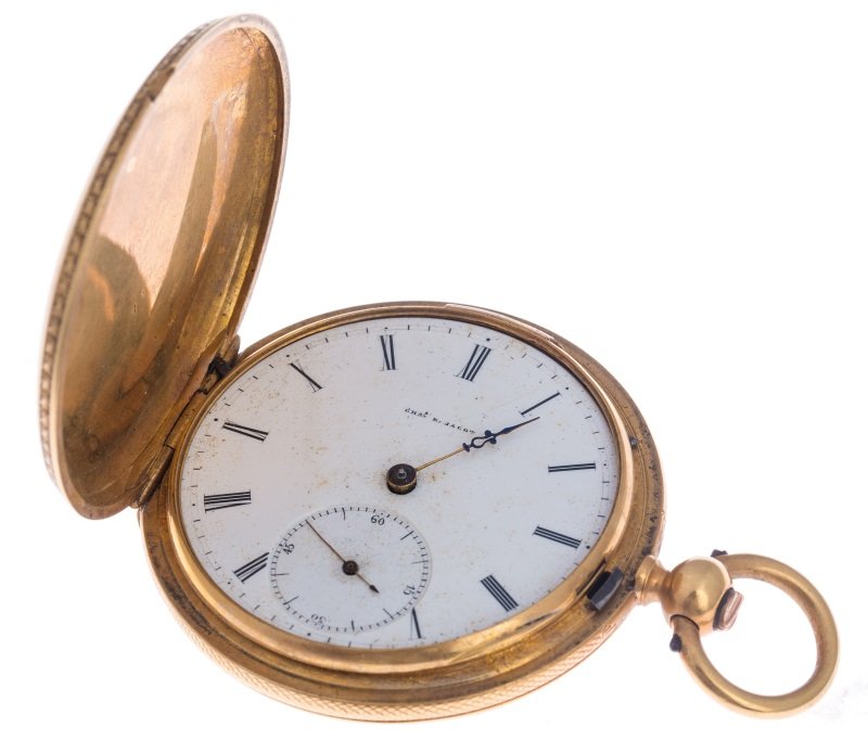 CHAS E JACOT 18K GOLD HUNTERS CASE POCKET WATCH: CHAS E JACOT 18K GOLD HUNTERS CASE POCKET WATCH Chas E Jacot 18K yellow gold hunters case pocket watch. Key wind. Black roman numerals with seconds dial at the 6 position. Case number 1708. Inside cas