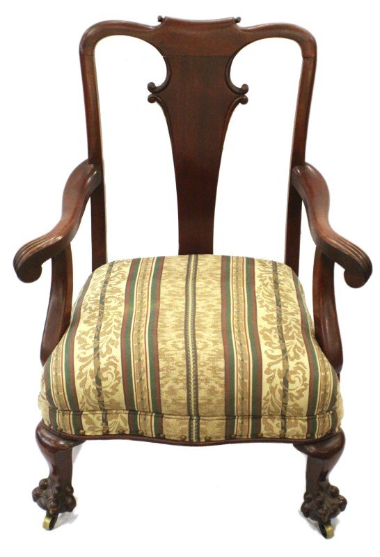 MAHOGANY NEW ENGLAND CHAIR: MAHOGANY NEW ENGLAND CHAIR Mahogany, stained, arm chair with compass shape, tight seat and nail ha trim, New England style pressed rail yoke, volute shape elongated spat, cabriole front leg with talon