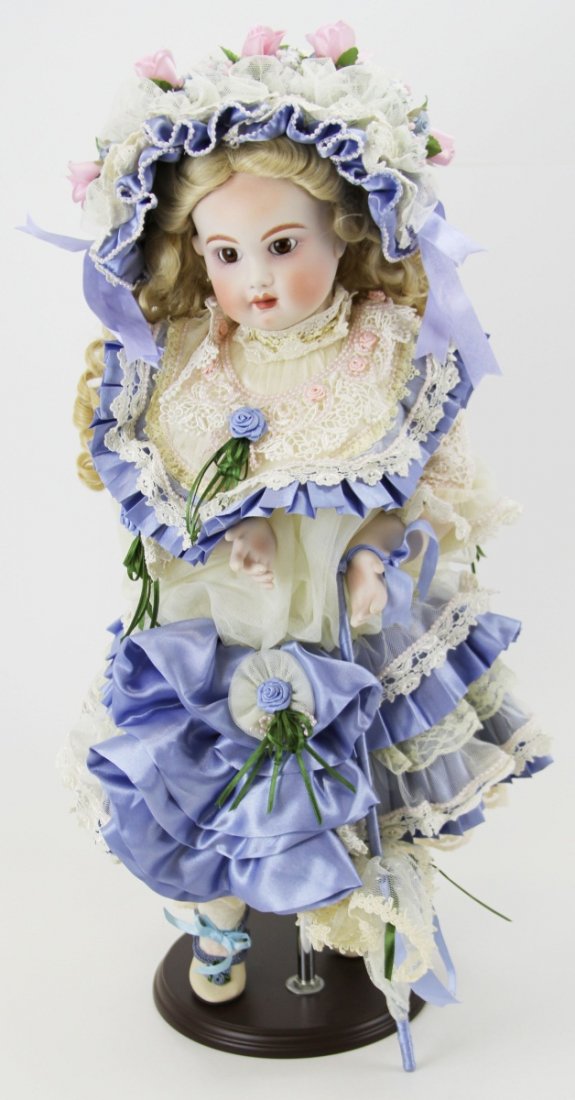 PATRICIA LOVELESS COLLECTOR'S DOLL: PATRICIA LOVELESS COLLECTOR'S DOLL Patricia Loveless "Anna Nicole"for the Enchantment of Jumeau series. Doll has a blue and white lace dress with flowers throughout. Doll has been displayed and may ne