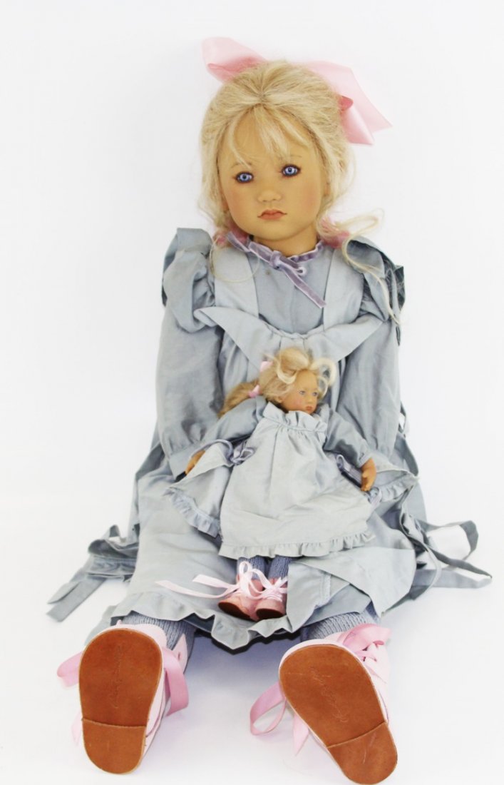 ANNETTE HIMSTEDT SKILLE GIRL FROM NORWAY DOLL: ANNETTE HIMSTEDT SKILLE GIRL FROM NORWAY DOLL Annette Himstedt "Skille" (girl from Norway) doll with mini doll dressed as her. Dressed in blue nightgown with pink boots and bow. Marked on head and com