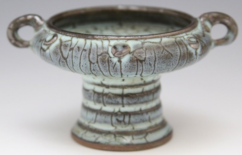 CHINESE CELADON CRACKLE BRUSH WASHER SONG: CHINESE CELADON CRACKLE BRUSH WASHER SONG Chinese brush washer in the shape of an urn with bead accents, blue crackle celadon glaze, Song. Size: 2.5" tall, 3" diameter at mouth