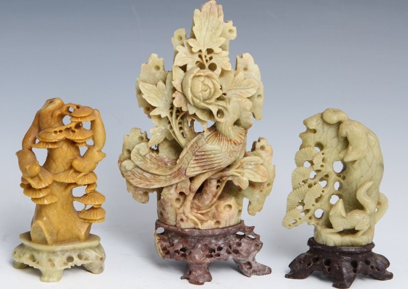(3) SOAPSTONE FIGURES W/ ANIMALS & A BIRD: (3) SOAPSTONE FIGURES W/ ANIMALS & A BIRD Lot of three soapstone carvings. One figure shows two foxes at play, another with two squirrels at play. The third figure is of a bird of paradise perched bes