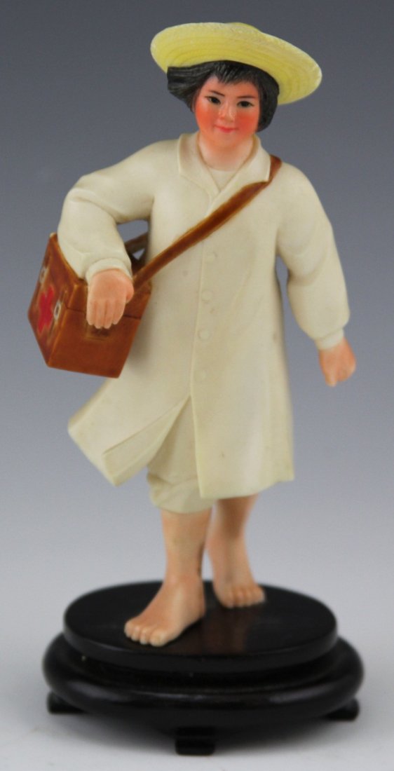 CHINESE CULTURAL REVOLUTION IVORY RED CROSS NURSE: CHINESE CULTURAL REVOLUTION IVORY RED CROSS NURSE Polychrome carved Chinese ivory figure, from the Cultural Revolution (1966-1976) under Mao Zedong of the Communist Party of China. Nurse with straw ha