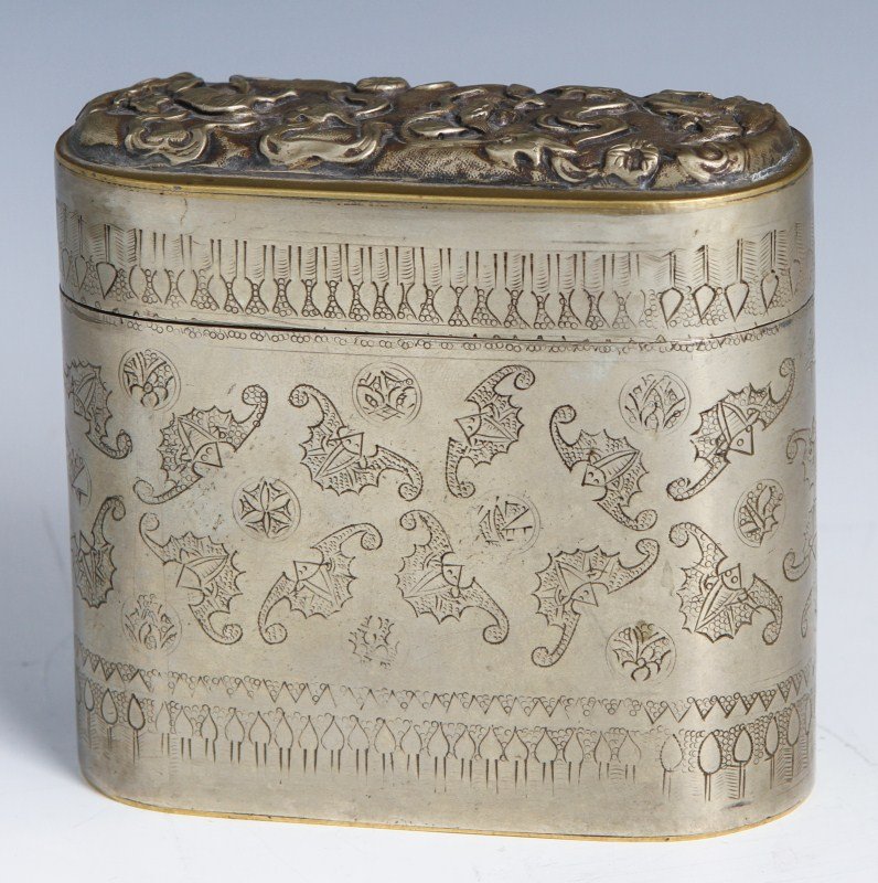 CHINESE STERLING SILVER TRINKET BOX: CHINESE STERLING SILVER TRINKET BOX Chinese sterling trinket box. Sides are etched with bat motif, top has relief of foo dogs. Bottom is marked "China". Weight: ~162.16g Size: 3.5 x 3.25 x 1.5"