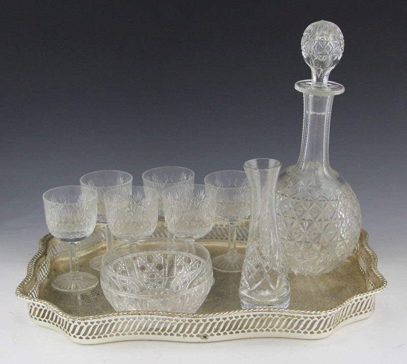 (9) THOMAS WEBB ENGLAND CRYSTAL PIECES AND TRAY: (9) THOMAS WEBB ENGLAND CRYSTAL PIECES AND TRAY (9) Thomas Webb England crystal pieces; 6 glasses, a candy dish, a bud vase and a liquor decanter. All are marked on base. Included is a scrolled silver