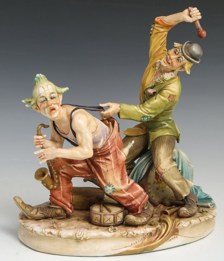 BORSATO PAGLIACCI SIGNED PORCELAIN FIGURE: BORSATO PAGLIACCI SIGNED PORCELAIN FIGURE Porcelain figure by Antonio Borsato, made in Italy. Pagliacci, #1040. Pagliacci is the Italian word for clowns. Figure is signed and stamped on the bottom. Si